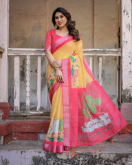 Woman wearing a yellow and pink saree with floral patterns on a rustic background