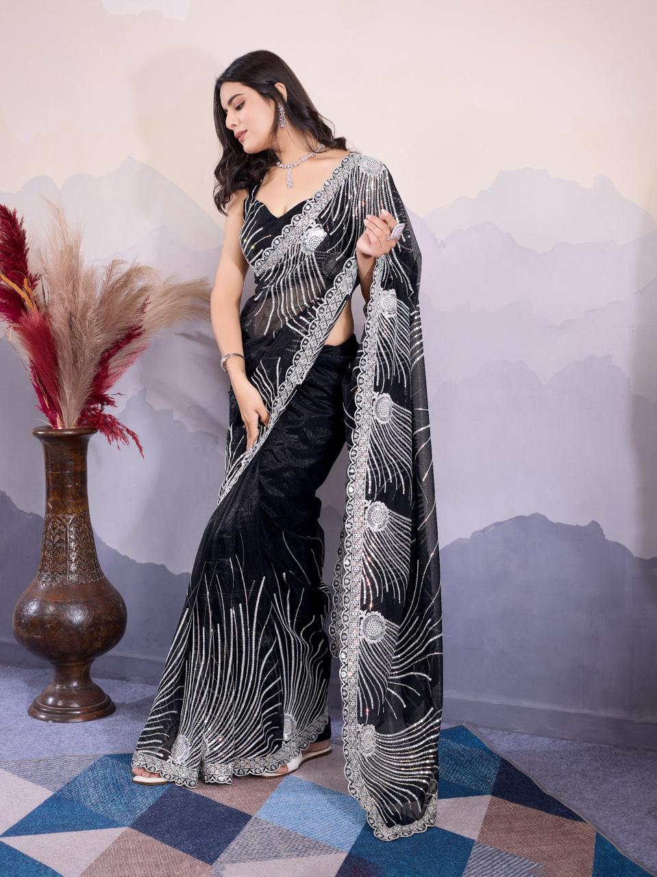 Black blouse with embroidery and sequence work featuring intricate sparkling designs