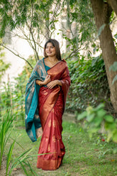 Brown saree with zari work and contrasting blue pallu
