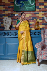 Mustard yellow saree with zari work and green border