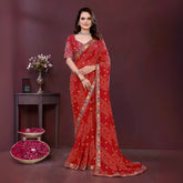 Woman wearing a red digital print saree with embroidery work and a contrast patterned border, paired with a matching blouse in an indoor studio product image, Indian ethnic wear