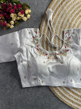 White floral embroidery Banglori silk blouse with intricate design, perfect for traditional and festive occasions.