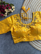 Yellow floral embroidery Banglori silk blouse with intricate design, perfect for traditional and festive occasions.