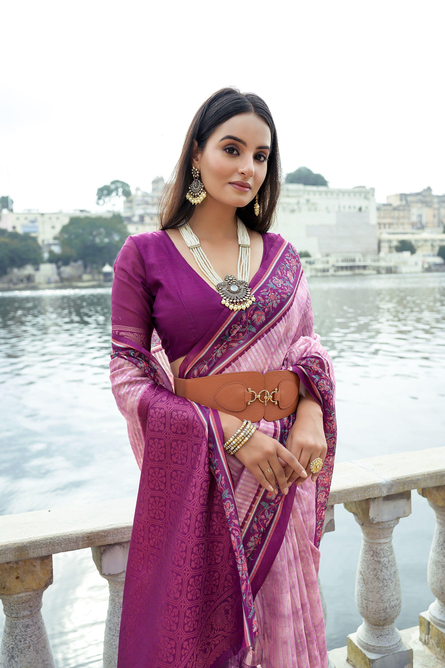 Light pink zari work soft silk saree showcasing intricate craftsmanship and elegant detailing, perfect for festive and traditional occasions.