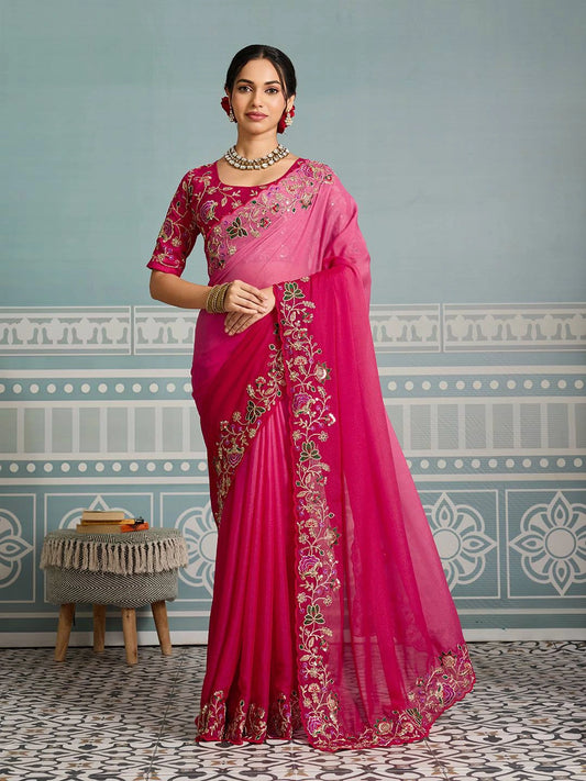 Dark pink soft georgette saree featuring intricate embroidery work, paired with a matching blouse piece. Elegant and lightweight, ideal for festive and ceremonial occasions.