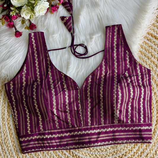 Deep Shade Purple blouse top with intricate zari work design, featuring elegant embroidery patterns, perfect for festive and traditional occasions.