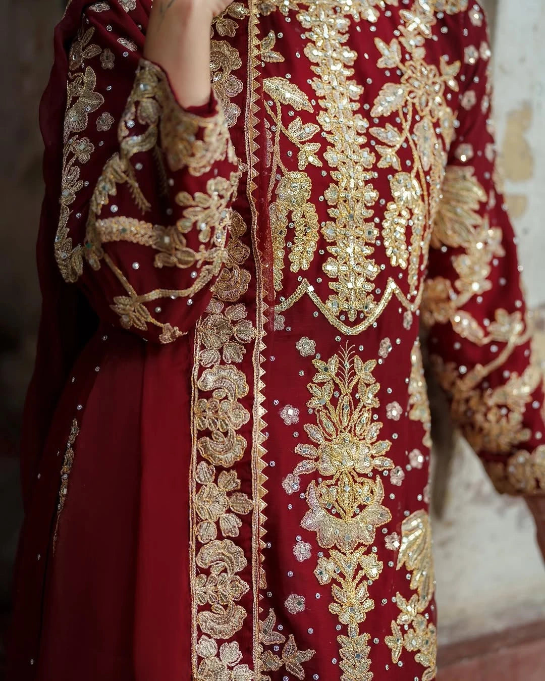 Red garment with intricate gold embroidery
