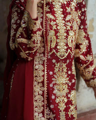 Red garment with intricate gold embroidery