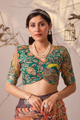 Woman wearing a traditional patterned blouse with a neutral background
