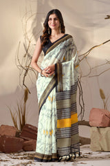 Woman wearing a traditional saree with a natural setting