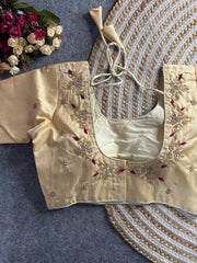 Beige floral embroidery Banglori silk blouse with intricate design, ideal for traditional and festive occasions.
