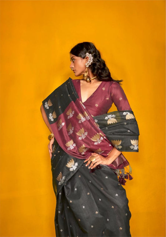 Black saree with zari work and contrasting maroon pallu