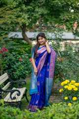 Blue saree with zari work and contrasting purple border