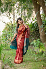 Brown saree with zari work and contrasting blue pallu