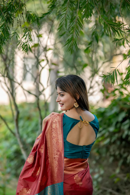 Brown saree with zari work and contrasting teal blouse