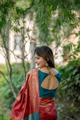 Brown saree with zari work and contrasting teal blouse