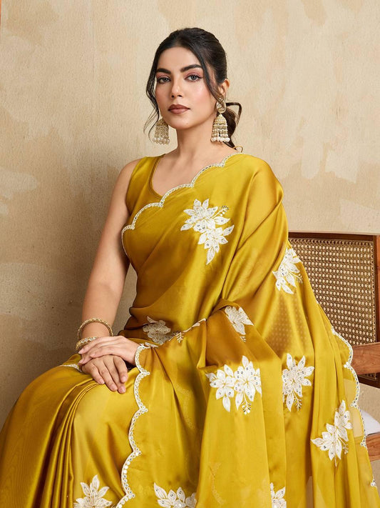 Traditional brown yellow saree crafted in luxurious rangoli silk fabric