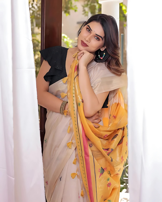 Traditional brown yellow saree with intricate resham and zari weaving design