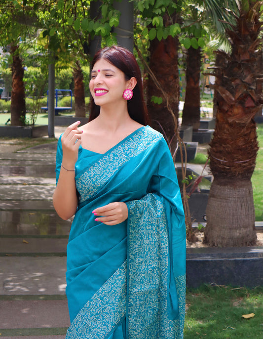 Cyan Blue Warli Weaving Soft Banglori Raw Silk Saree featuring intricate handloom craftsmanship, perfect for reception, sangeet, and festive occasions.