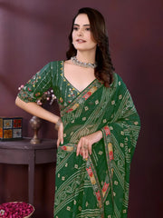 Woman wearing a dark green digital print saree with embroidery work and a contrast patterned border, paired with a matching blouse in an indoor studio product image, Indian ethnic wear