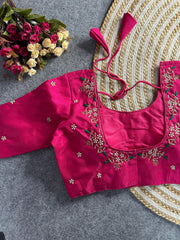 Dark pink floral embroidery Banglori silk blouse with intricate design, ideal for traditional and festive occasions.