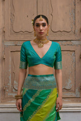 Close up of green saree with intricate Kadwa style weaving