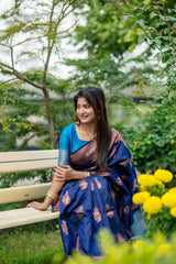 Navy blue saree with zari work and contrasting purple border