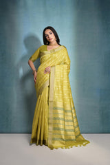 Pale yellow saree featuring intricate ikkat and zari weaving, showcasing traditional handloom textile craftsmanship
