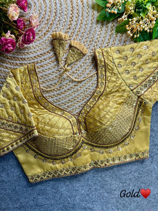 Pale yellow blouse crafted from soft silk fabric, featuring delicate sequence and codding thread work.