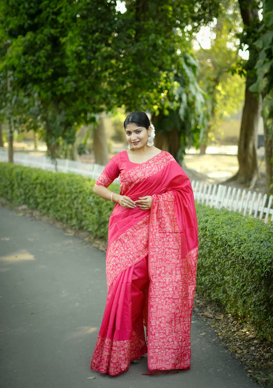 Smiling woman in pink saree with Gala Border pattern