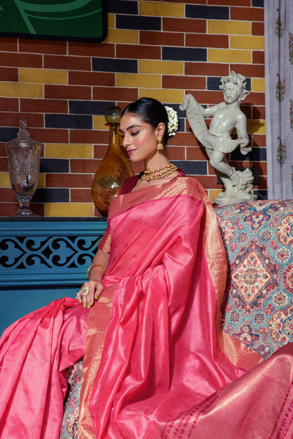 Pink saree with intricate zari work and gold border