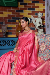 Pink saree with intricate zari work and gold border
