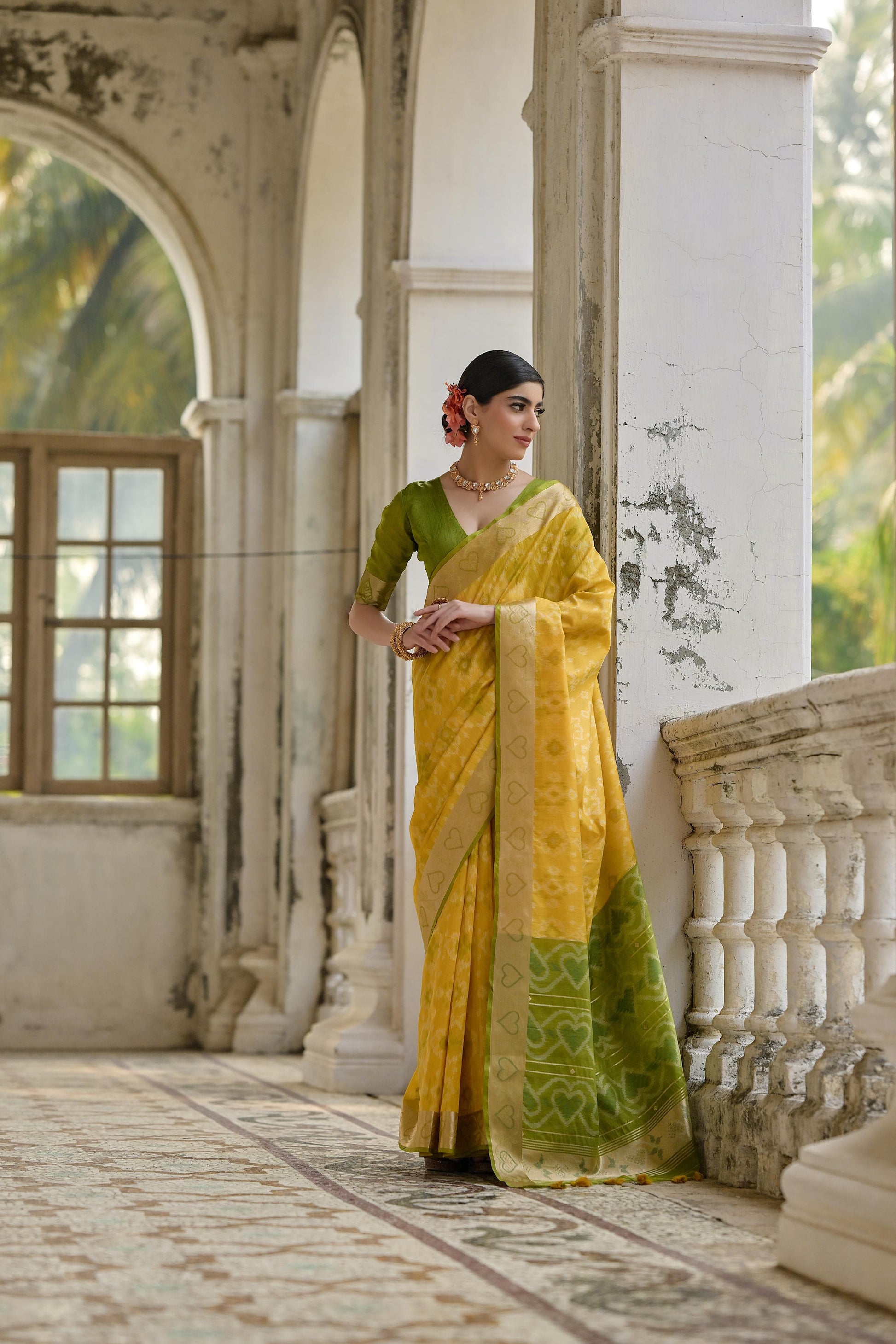 Woman wearing brown red Pochampali Ikkat saree