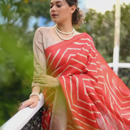 woman-geometric-silk-saree-floral-embroidered-pallu-pearl-jewelry-modern-cafe