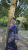 Navy blue saree with intricate Gala Border pattern closeup in forest