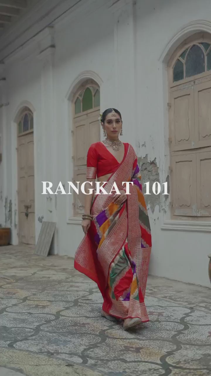 Red Tussar Silk saree with Kadwa style weaving and multicolor design