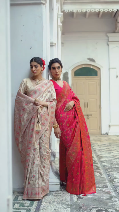 woman-cream-floral-silk-saree-pink-border-traditional-jewelry-heritage-background