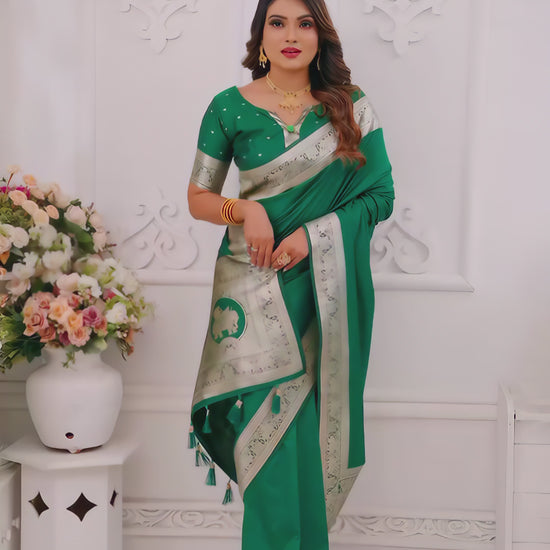 emerald-green-silk-saree-silver-border-floral-room