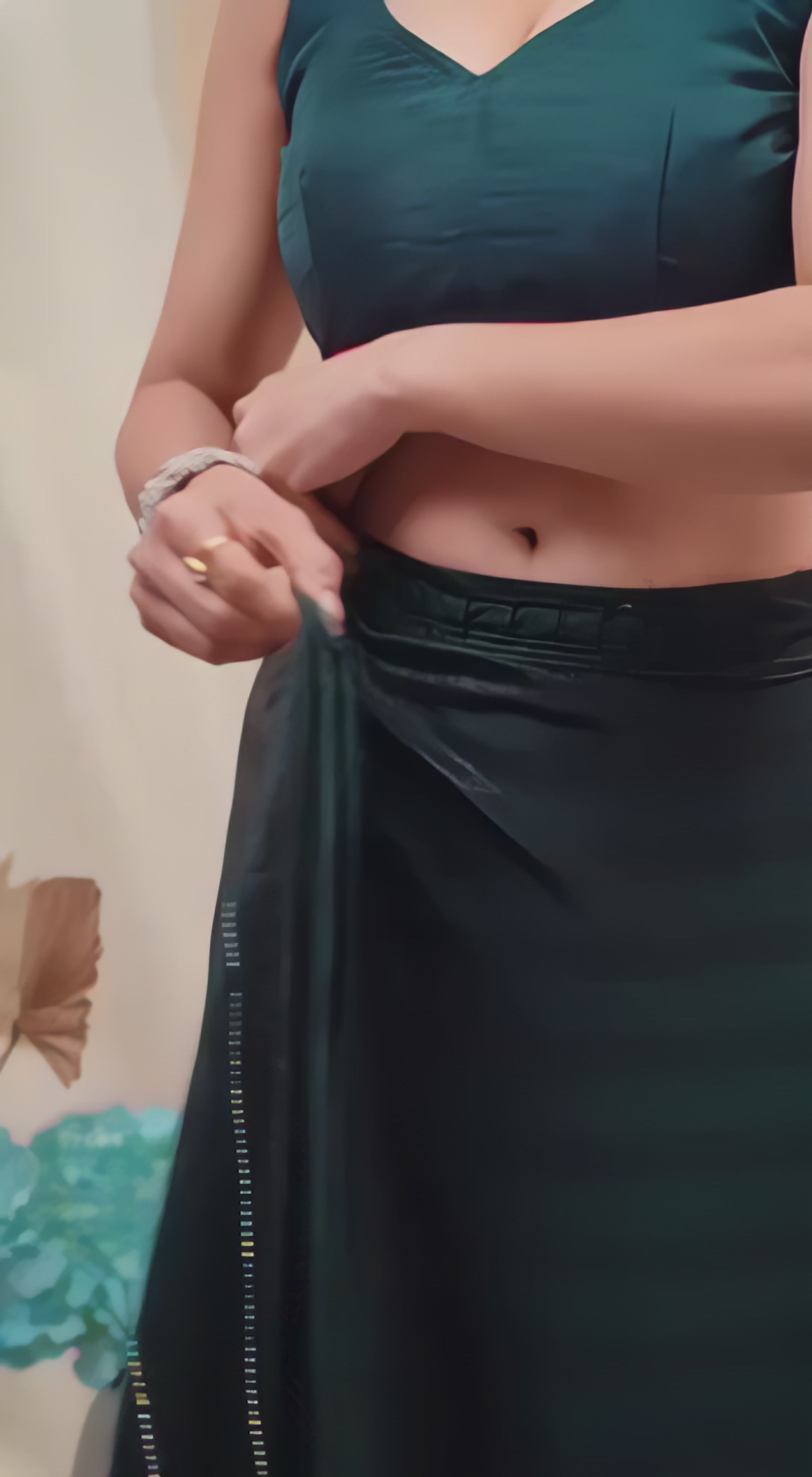 dark-green-sequined-saree-sleeveless-blouse-modern-interior