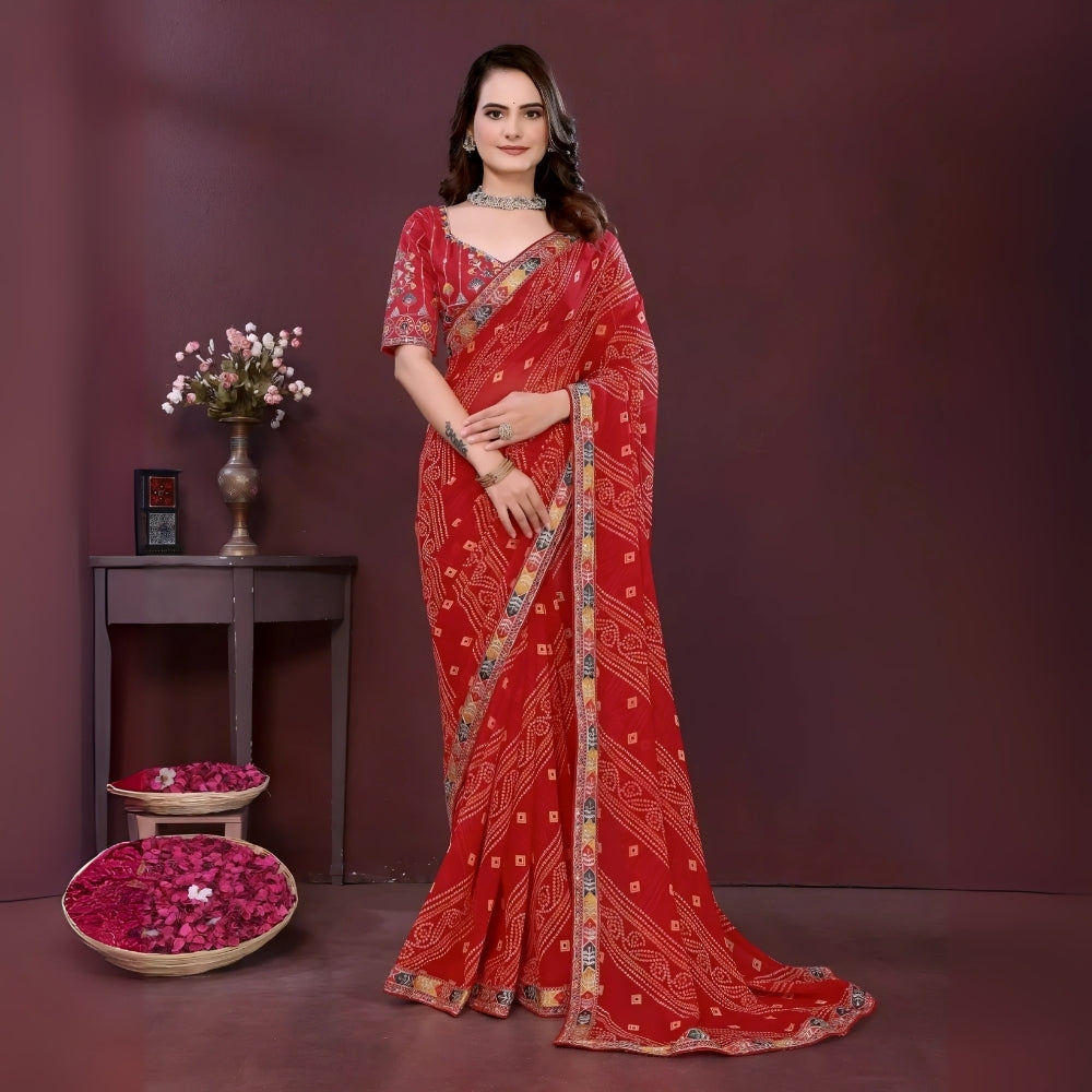 Woman wearing a red digital print saree with embroidery work and a contrast patterned border, paired with a matching blouse in an indoor studio product image, Indian ethnic wear