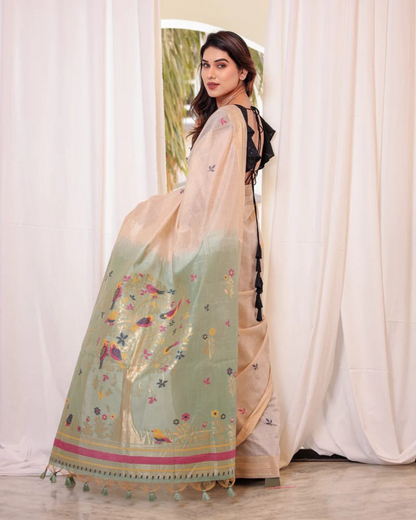 Elegant soft pastel green saree featuring detailed resham and zari weaving work