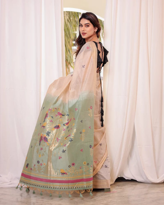 Elegant soft pastel green saree featuring detailed resham and zari weaving work
