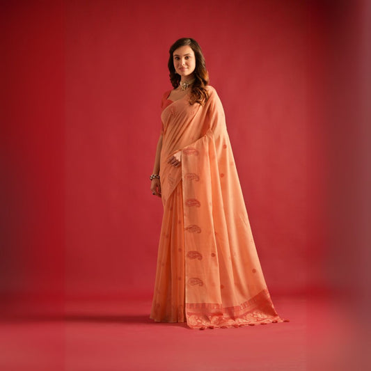 Soft peach fabric with delicate resham weaving