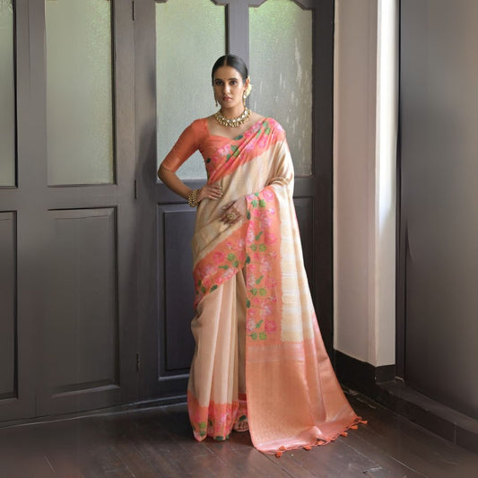Soft peach saree with elegant zari work design