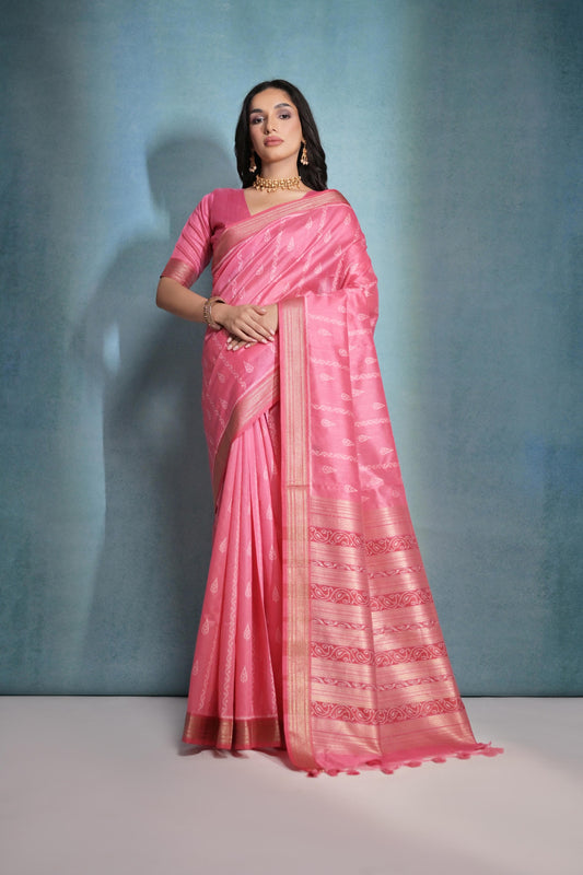 Tulip pink saree with intricate ikkat and zari weaving, showcasing traditional handloom textile craftsmanship