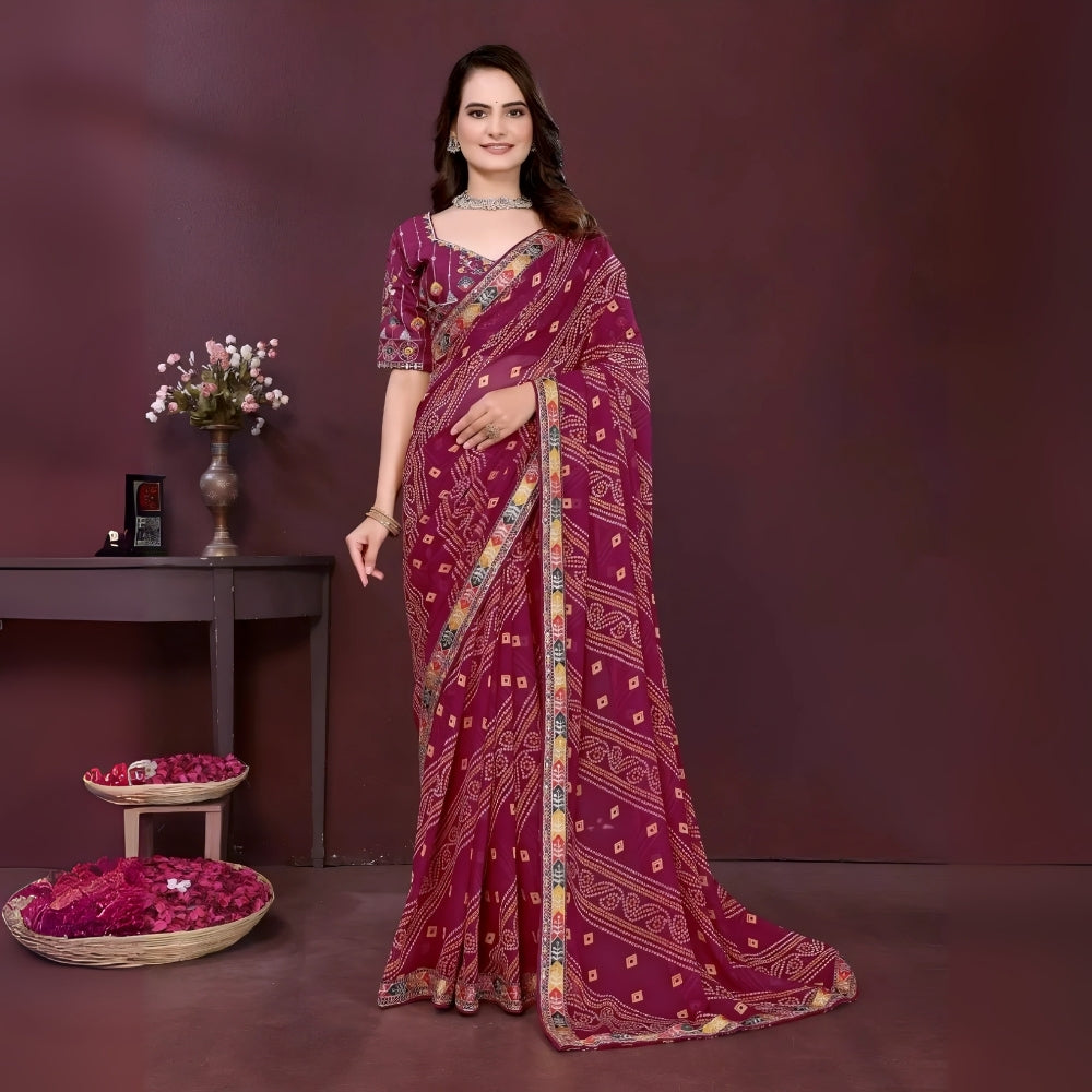 Woman wearing a wine color digital print saree with embroidery work and a contrast patterned border, paired with a matching blouse in an indoor studio product image, Indian ethnic wear
