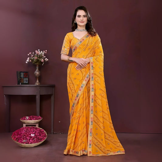 Woman wearing a yellow digital print saree with embroidery work and a contrast patterned border, paired with a matching blouse in an indoor studio product image