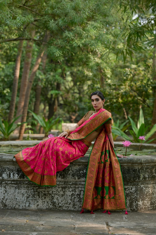 Dark pink Zari work soft Pashmina silk saree featuring intricate Kashmiri-style jal weaving, ideal for festive and traditional occasions.